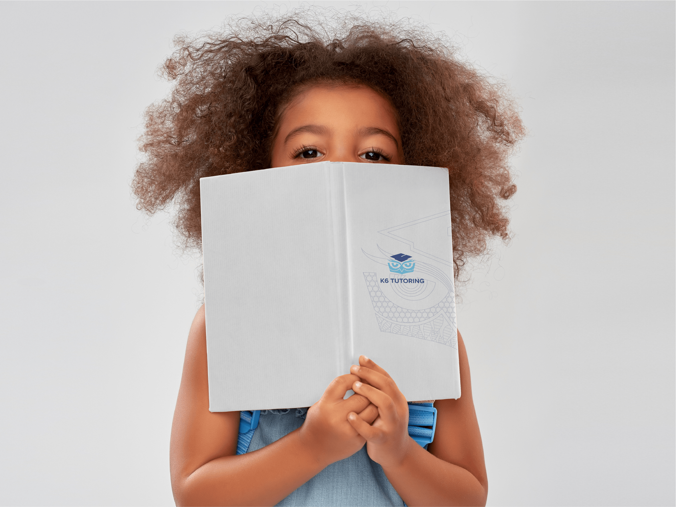 k6-tutoring_child-with-book